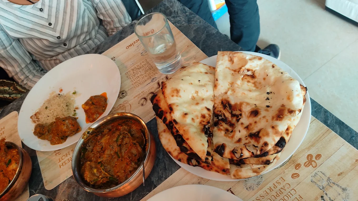 Butter naan with a rich curry