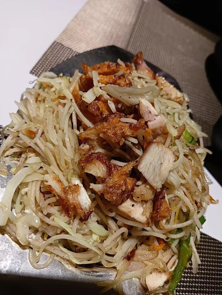 Wok-tossed chowmein plated for the table